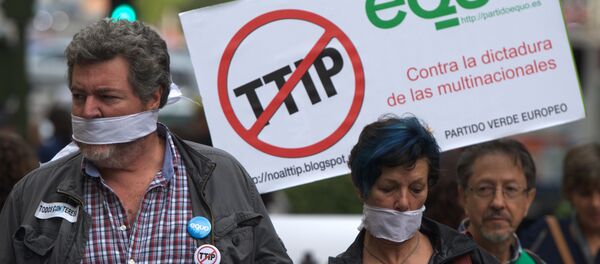 Protesters take part in demonstration against Transatlantic Trade and Investment Partnership (TTIP) in Madrid. (File) Protesters take part in demonstration against Transatlantic Trade and Investment Partnership (TTIP) in Madrid. (File) - Sputnik International