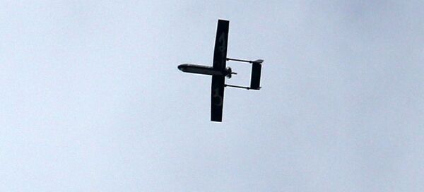 A drone belonging to the Ezzedine al-Qassam Brigades, Hamas' armed wing, flies over Gaza City on December 14, 2014 during a parade by Palestinian militants marking the 27th anniversary of the Islamist movement’s creation. A drone belonging to the Ezzedine al-Qassam Brigades, Hamas' armed wing, flies over Gaza City on December 14, 2014 during a parade by Palestinian militants marking the 27th anniversary of the Islamist movement’s creation. - Sputnik International