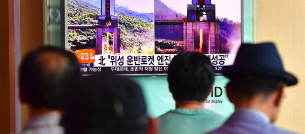 People watch a television news report about North Korea's latest ground test for a rocket engine, at a railway station in Seoul on September 20, 2016 People watch a television news report about North Korea's latest ground test for a rocket engine, at a railway station in Seoul on September 20, 2016 - Sputnik International