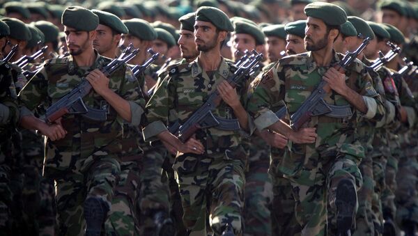 Members of Iran's Revolutionary Guards march during a military parade to commemorate the 1980-88 Iran-Iraq war in Tehran. - Sputnik International