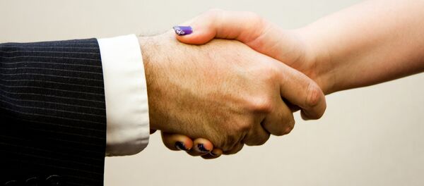 Handshake man - women Handshake man - women - Sputnik International