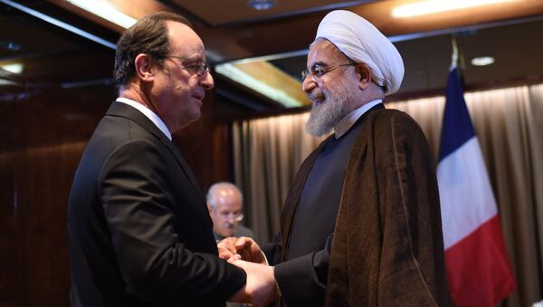 French President Francois Hollande (L) meets with Hassan Rouhani, Iran's President, on the sidelines of the 71st session of the UN General Assembly in New York on September 20, 2016 - Sputnik International