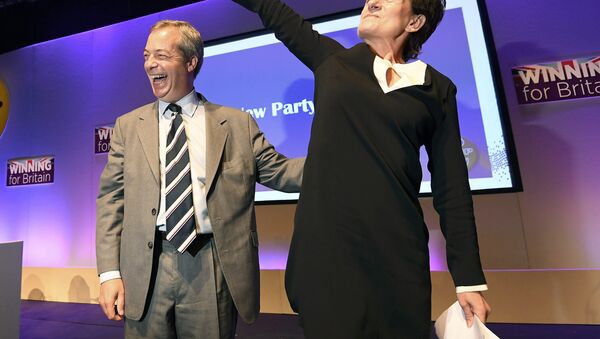 Nigel Farage (L), the outgoing leader of the United Kingdom Independence Party (UKIP), congratulates new leader Diane James, at the party's annual conference in Bournemouth, Britain, September 16, 2016. - Sputnik International
