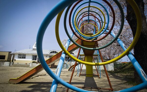 Playground at a kindergarten in the deserted town of Futaba, inside the 12-mile evacuation zone around the crippled Fukushima Daiichi nuclear power plant. - Sputnik International