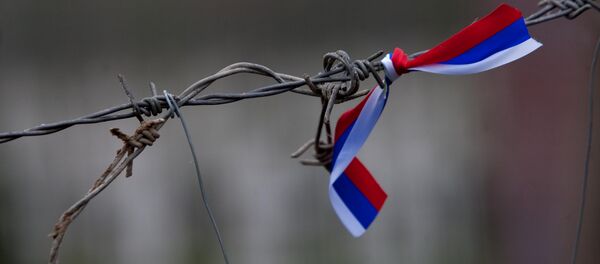 Barbed wire with a Russian flag - Sputnik International