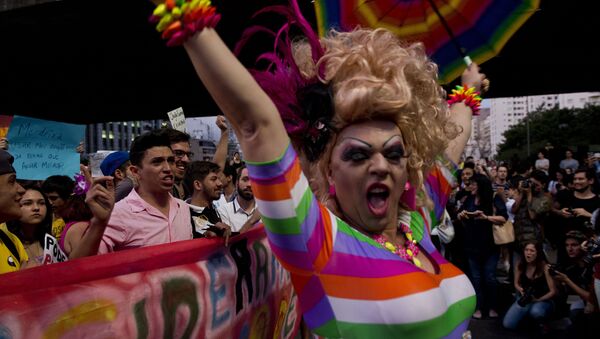 Sympathizers of the LGBT (Lesbian, Gay, Bisexual, Transvestite and Transsexual) community take part in a protest at Paulista Avenue in Sao Paulo, Brazil on September 30, 2014 - Sputnik International