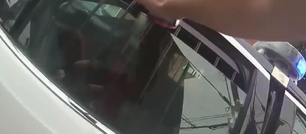 Maryland Police Pepper Spray 15-Year in Police Car: Her Crime? She Hit a Car on her Bike - Sputnik International