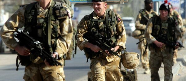 British soldiers patrol a street in the southern city of Basra, 11 December 2005. British soldiers patrol a street in the southern city of Basra, 11 December 2005. - Sputnik International