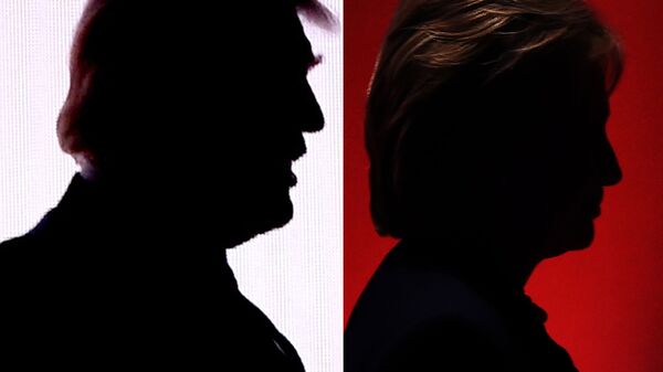 This combination of file photos shows the silhouettes of Republican presidential nominee Donald Trump(R) July 18, 2016 and Democratic presidential nominee Hillary Clinton on February 4, 2016. - Sputnik International