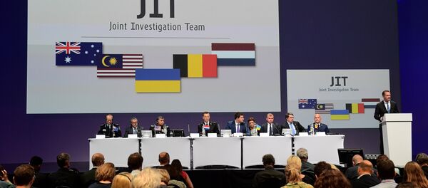 Members of a joint investigation team present the preliminary results of the criminal investigation into the downing of Malaysia Airlines flight MH17 , in Nieuwegein Members of a joint investigation team present the preliminary results of the criminal investigation into the downing of Malaysia Airlines flight MH17 , in Nieuwegein - Sputnik International