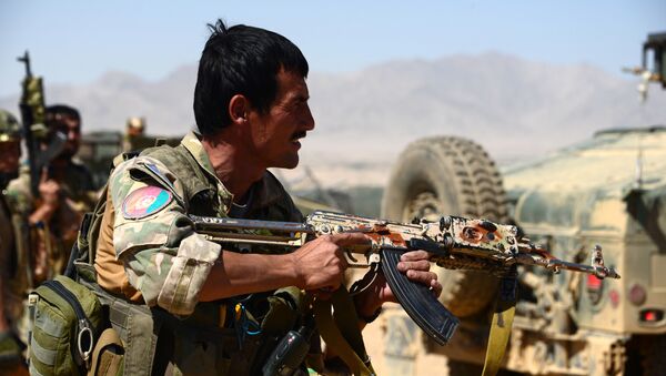 Afghan security personnel take part in a patrol during an operation against Taliban militants in Garmaw Manda in Uruzgan province - Sputnik International