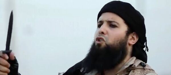 This image from video provided by the SITE Intelligence Group shows Rachid Kassim as he appeared on a video released on militant websites. (File) This image from video provided by the SITE Intelligence Group shows Rachid Kassim as he appeared on a video released on militant websites. (File) - Sputnik International