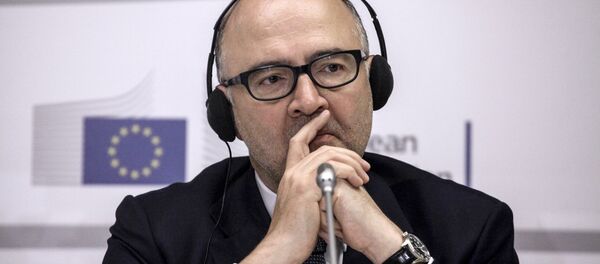 European Commissioner for Economic and Financial Affairs Pierre Moscovici listens to Greece's Finance Minister Euclid Tsakalotos (Unseen) during joint statements to the press at the EU representation office in Athens on July 18, 2016. European Commissioner for Economic and Financial Affairs Pierre Moscovici listens to Greece's Finance Minister Euclid Tsakalotos (Unseen) during joint statements to the press at the EU representation office in Athens on July 18, 2016. - Sputnik International
