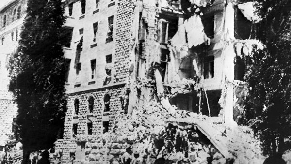 A picture taken 22 July 1946 shows the King David Hotel in Jerusalem, which housed the British Headquarters, damaged after a bombing attack against the British government by members of Irgun, a Zionist terrorist group headed by Menachem Begin. - Sputnik International