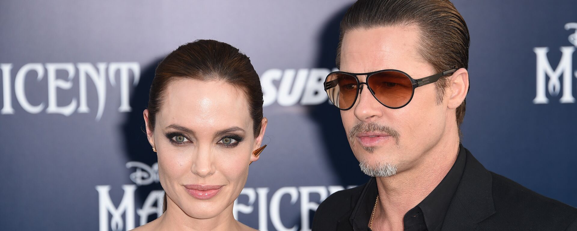 Angelina Jolie and Brad Pitt arrive for the world premiere of Disney's Maleficent, May 28, 2014, at El Capitan Theatre in Hollywood, California. - Sputnik International, 1920, 05.10.2022