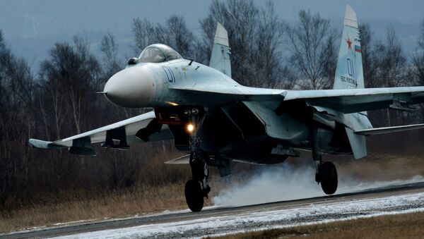 Su-27SM fighter lands as part of the tactical flight drill by fighter aircraft of the Eastern Military District conducted at Tsentralnaya Uglovaya military airfield in Primorye Territory - Sputnik International