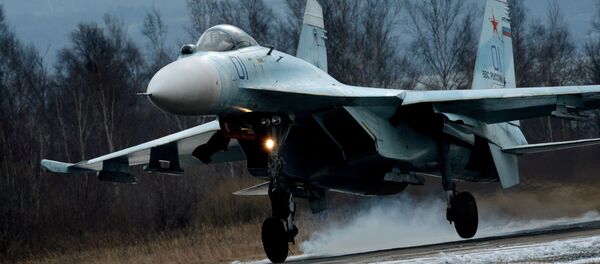 Su-27SM fighter lands as part of the tactical flight drill by fighter aircraft of the Eastern Military District conducted at Tsentralnaya Uglovaya military airfield in Primorye Territory Su-27SM fighter lands as part of the tactical flight drill by fighter aircraft of the Eastern Military District conducted at Tsentralnaya Uglovaya military airfield in Primorye Territory - Sputnik International