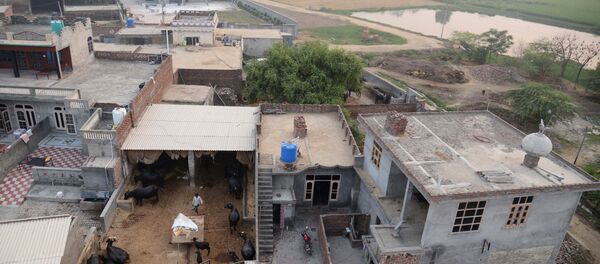 An aerial view of the India-Pakistan border village of Daoke, about 40 kms from Amritsar on September 30, 2016 - Sputnik International