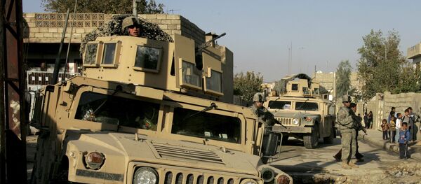 U.S. Army soldiers of Lightning Troop, 3rd Squadron, 3rd Armored Cavalry Regiment, make their way across a street flooded with sewage with their military vehicles, during a routine patrol in Al Islah Al Serai neighborhood, northwestern Mosul, 360 kilometers (224 miles) northwest of Baghdad, Iraq (File) U.S. Army soldiers of Lightning Troop, 3rd Squadron, 3rd Armored Cavalry Regiment, make their way across a street flooded with sewage with their military vehicles, during a routine patrol in Al Islah Al Serai neighborhood, northwestern Mosul, 360 kilometers (224 miles) northwest of Baghdad, Iraq (File) - Sputnik International