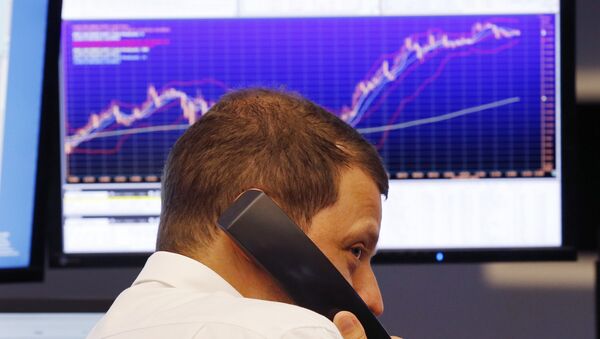 A trader makes a telephone call at the stock market in Frankfurt, Germany (File) - Sputnik International