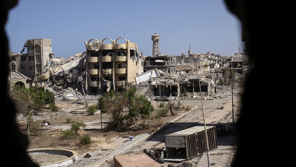 A general view shows destroyed buildings in the District 3 neighbourhood of Sirte, the last stronghold of Islamic State (IS) group in the coastal Libyan city, on September 29, 2016 - Sputnik International