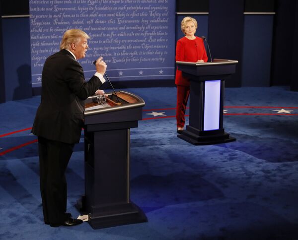 Republican presidential nominee Donald Trump gestures during the presidential debate with Democratic presidential nominee Hillary Clinton at Hofstra University in Hempstead, N.Y., Monday, Sept. 26, 2016 Republican presidential nominee Donald Trump gestures during the presidential debate with Democratic presidential nominee Hillary Clinton at Hofstra University in Hempstead, N.Y., Monday, Sept. 26, 2016 - Sputnik International
