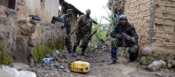 Congolese army soldiers take cover during an assault on rebel-held Jomba, as they advance toward Bunagana, eastern Congo (File) - Sputnik International