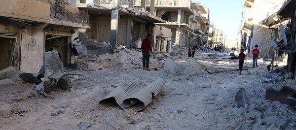 People inspect a damaged site after airstrikes on the rebel held Sheikh Fares neighbourhood of Aleppo, Syria October 1, 2016 People inspect a damaged site after airstrikes on the rebel held Sheikh Fares neighbourhood of Aleppo, Syria October 1, 2016 - Sputnik International