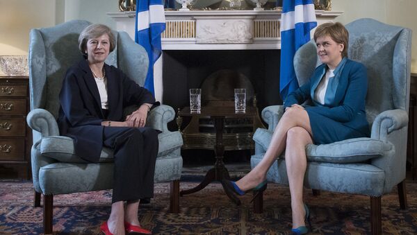 Britain's new Prime Minister Theresa May (L) meets with Scotland's First Minister Nicola Sturgeon in Bute House in Edinburgh, on July 15, 2016. - Sputnik International