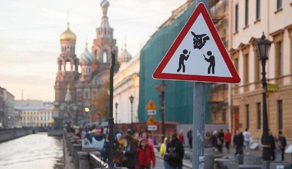 Road sign Caution! Pokemon Сatchers! - Sputnik International