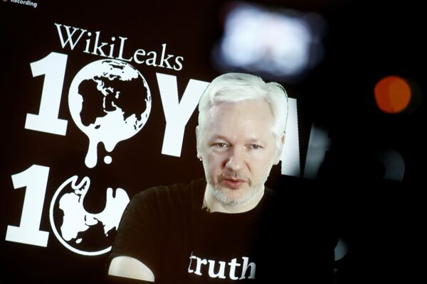 Julian Assange, Founder and Editor-in-Chief of WikiLeaks speaks via video link during a press conference on the occasion of the ten year anniversary celebration of WikiLeaks in Berlin, Germany, October 4, 2016. Julian Assange, Founder and Editor-in-Chief of WikiLeaks speaks via video link during a press conference on the occasion of the ten year anniversary celebration of WikiLeaks in Berlin, Germany, October 4, 2016. - Sputnik International