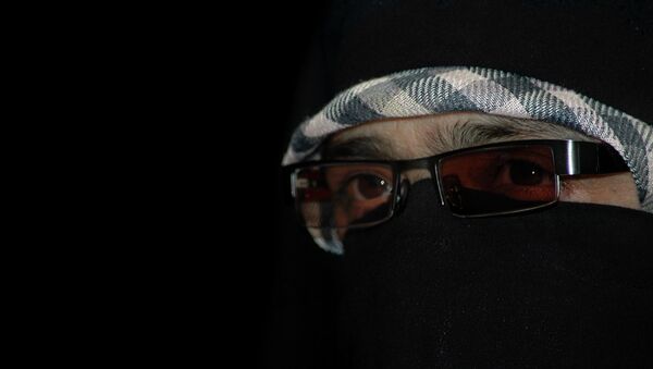 Chief of Kashmiri women's separatist group, Dukhtran-e-milat, or Daughters of the Nation, Asiya Andrabi, looks on during a press conference in Srinagar, India. (File) - Sputnik International
