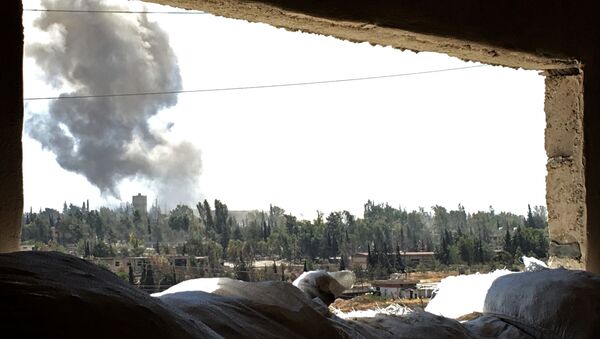 Smoke over Ramuse district of southern Aleppo. (File) - Sputnik International