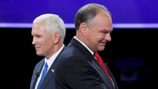 Democratic U.S. vice presidential nominee Senator Tim Kaine and Republican U.S. vice presidential nominee Governor Mike Pence (L) pass each other after the conclusion of their vice presidential debate at Longwood University in Farmville, Virginia, U.S., October 4, 2016. - Sputnik International