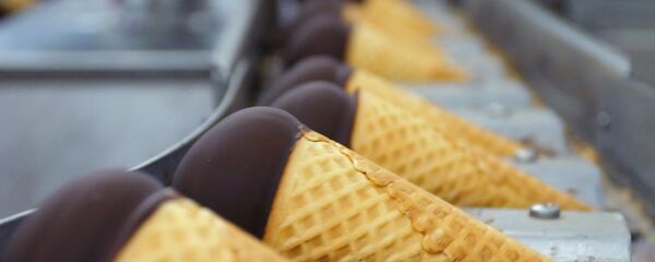 Chocolate ice cream cone production line. Chocolate ice cream cone production line. - Sputnik International
