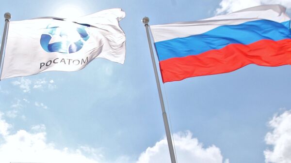 Russian and Rosatom State Corporation flags. (File) - Sputnik International
