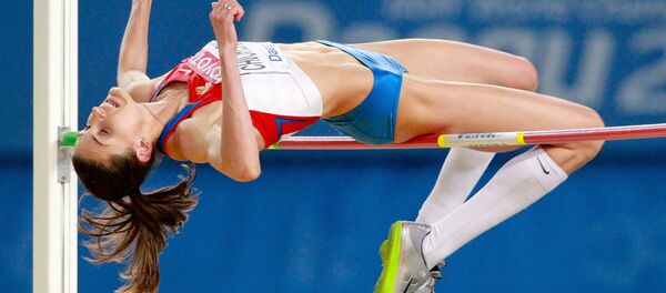 Russia's Anna Chicherova, gold winner in high-jump at the World Athletics Championship in Daegu, South Korea, takes part in the competition. (File) - Sputnik International