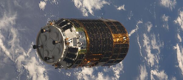 Backdropped by a blue and white part of Earth, the unpiloted Japanese H-II Transfer Vehicle (HTV) approaches the International Space Station Backdropped by a blue and white part of Earth, the unpiloted Japanese H-II Transfer Vehicle (HTV) approaches the International Space Station - Sputnik International