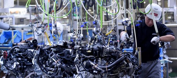(FILES) This file photo taken on April 5, 2016 shows an employee working at the main assembly line of V6 engines at the Iwaki Plant of Japan's Nissan Motor in Iwaki, Fukushima prefecture (FILES) This file photo taken on April 5, 2016 shows an employee working at the main assembly line of V6 engines at the Iwaki Plant of Japan's Nissan Motor in Iwaki, Fukushima prefecture - Sputnik International