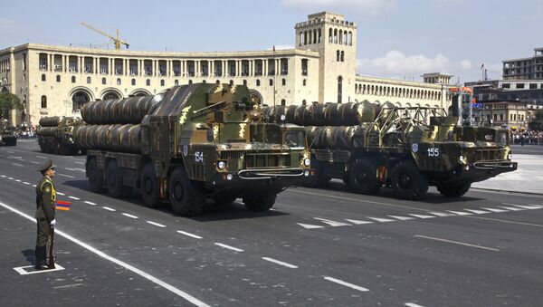 Missile launchers move during a military parade marking the 20th anniversary of Armenia's Independence Day in Yerevan, Armenia, Wednesday, Sept. 21, 2011 - Sputnik International