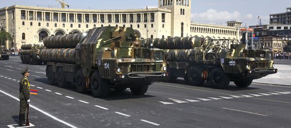 Missile launchers move during a military parade marking the 20th anniversary of Armenia's Independence Day in Yerevan, Armenia, Wednesday, Sept. 21, 2011 - Sputnik International
