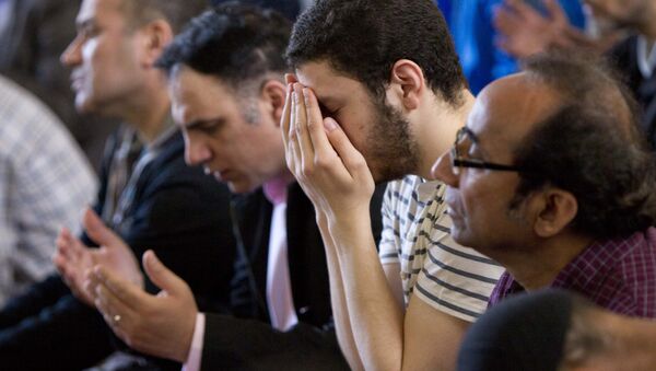 Men pray during a service at the Islamic Society of Boston mosque in Cambridge, Mass. on Friday, April 26, 2013 - Sputnik International