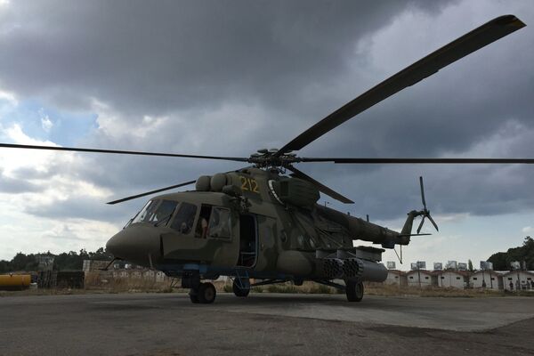 Russian cargo and assault Mi-8AMShT helicopter at the Hmeimim air base in Syria Russian cargo and assault Mi-8AMShT helicopter at the Hmeimim air base in Syria - Sputnik International