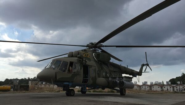 Russian cargo and assault Mi-8AMShT helicopter at the Hmeimim air base in Syria - Sputnik International