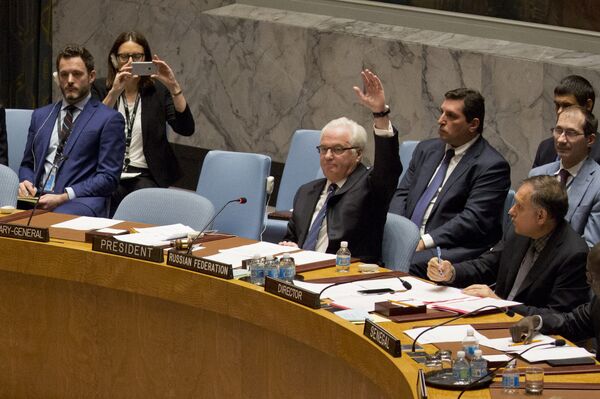 Russian ambassador to the United Nations Vitaly Churkin vetoes a Security Council vote on a French-Spanish resolution on Syria at the UN headquarters, October 8, 2016, in New York City Russian ambassador to the United Nations Vitaly Churkin vetoes a Security Council vote on a French-Spanish resolution on Syria at the UN headquarters, October 8, 2016, in New York City - Sputnik International