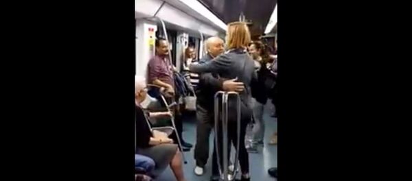 Elderly pair dances to rap music at Barcelona subway Elderly pair dances to rap music at Barcelona subway - Sputnik International