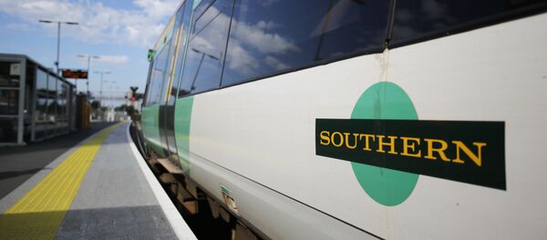 A Southern Rail logo is pictured on the side of a train carriage as t stands at a platform at East Croydon station, south of London A Southern Rail logo is pictured on the side of a train carriage as t stands at a platform at East Croydon station, south of London - Sputnik International