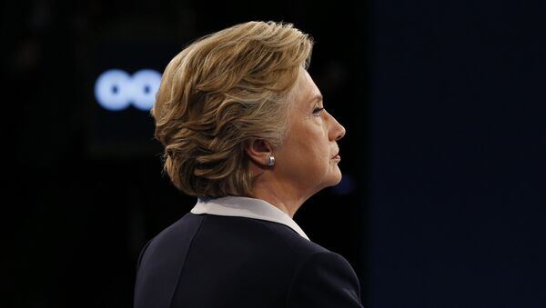 Democratic presidential nominee Hillary Clinton looks on during the second presidential debate at Washington University in St. Louis, Missouri on October 9, 2016. - Sputnik International