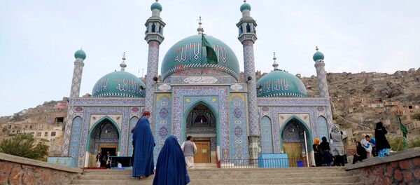 Afghan burqa-clad women visit The Karte Sakhi Shrine in Kabul - Sputnik International