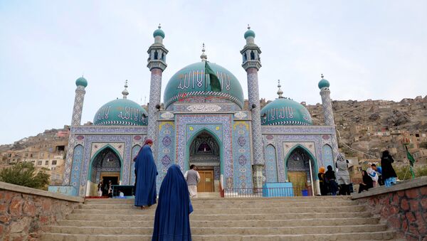 Afghan burqa-clad women visit The Karte Sakhi Shrine in Kabul - Sputnik International
